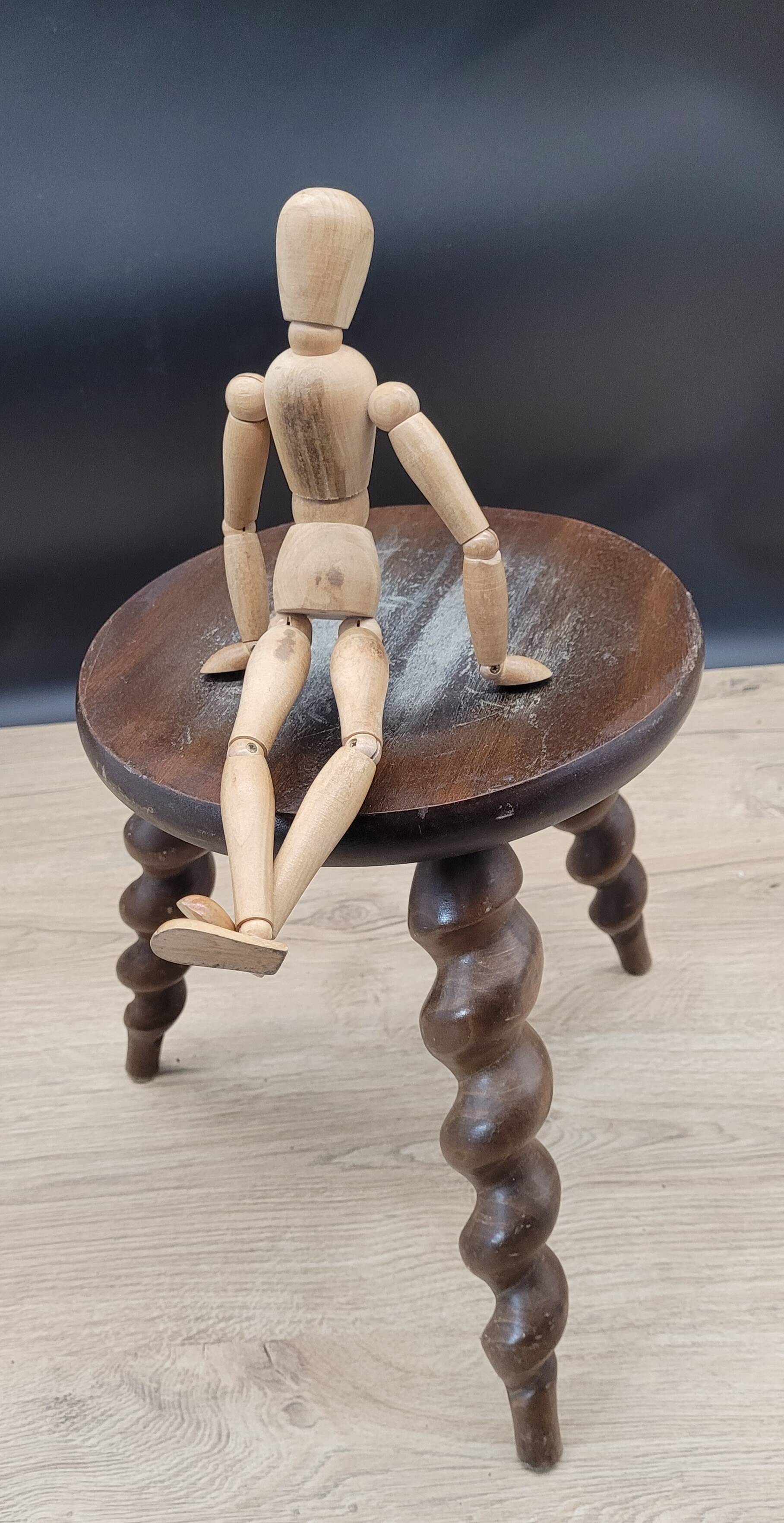 Tripod stool with turned legs