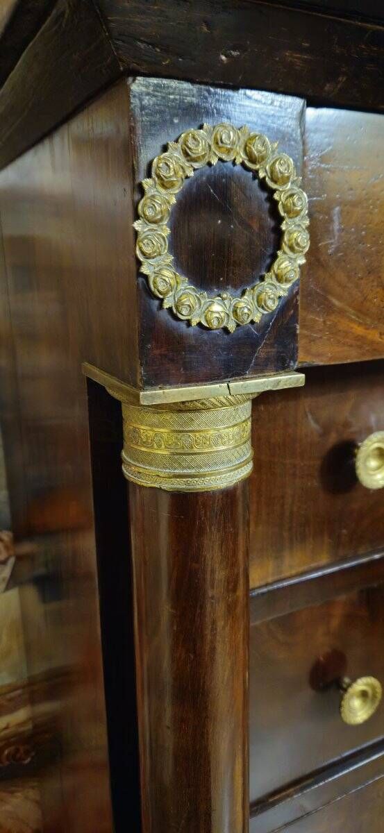 Empire period chest of drawers, early 19th century, in flame mahogany.