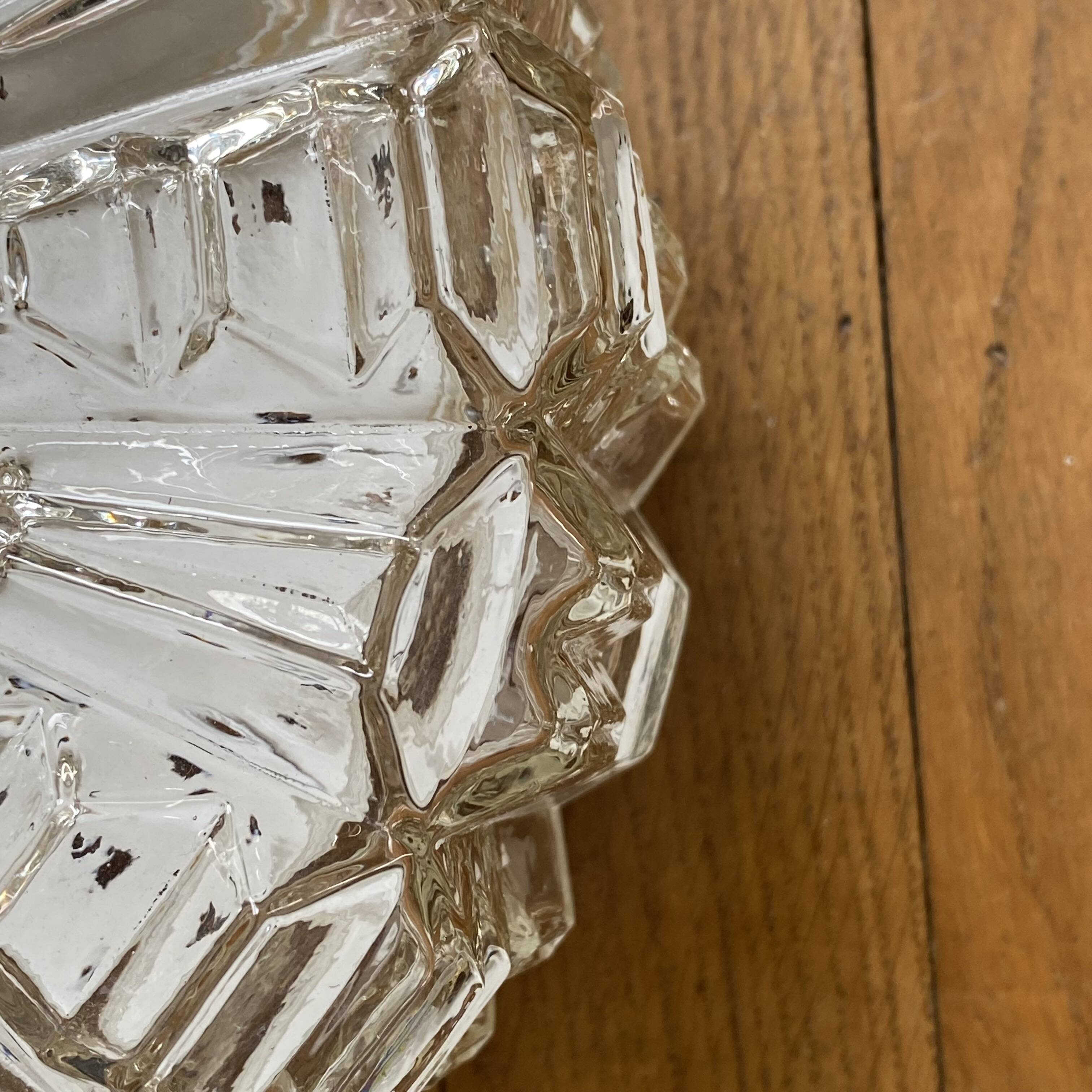 Wall lamp or ceiling light with minimalist porthole glass.