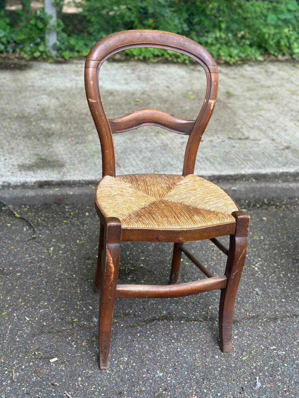 Vintage solid oak chair with rush seat, Louis Philippe style from the 20th century.
