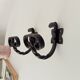 Pair of antique wrought iron coat hooks