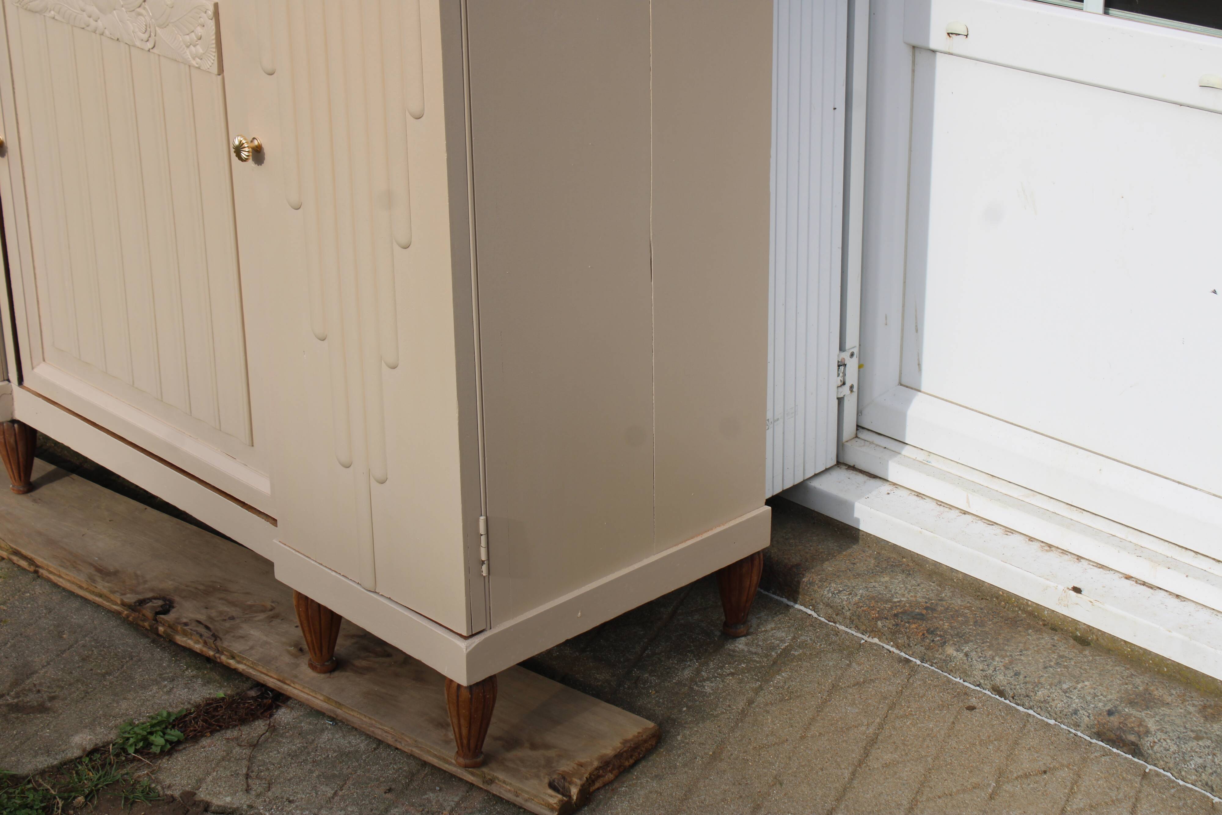 Renovated Art Deco buffet, pink marble and original mirror.