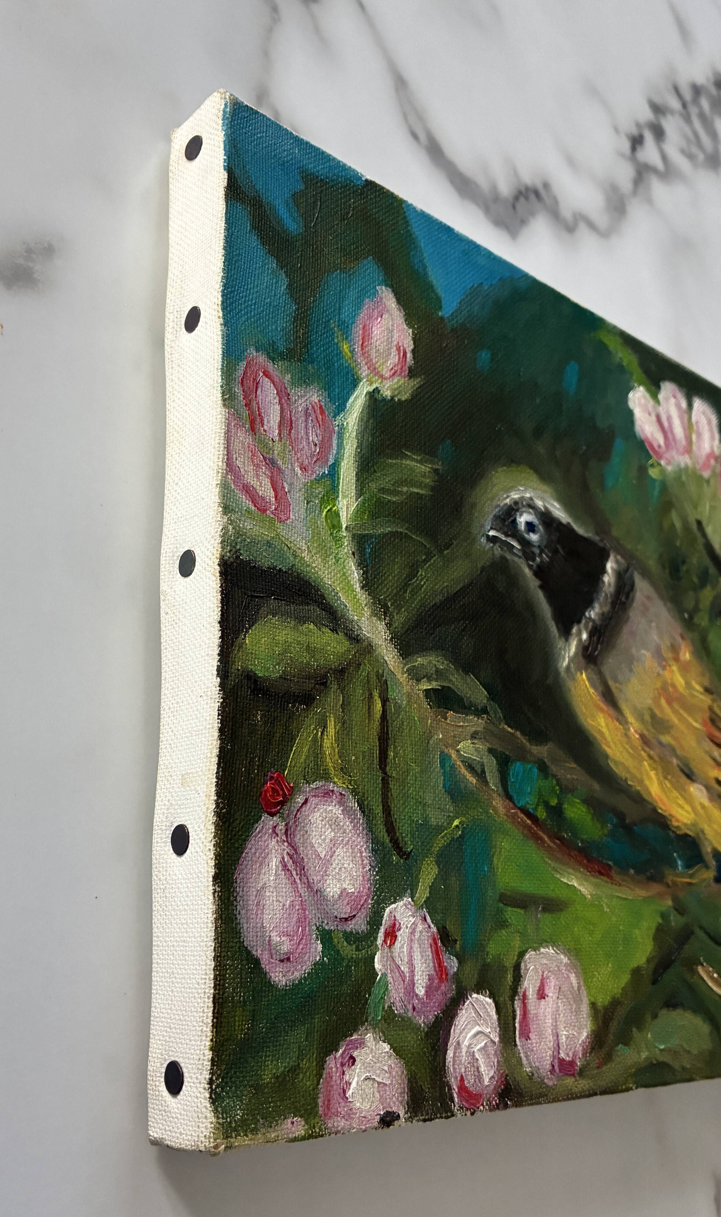 Oil painting still life of a goldfinch.