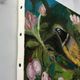 Oil painting still life of a goldfinch.