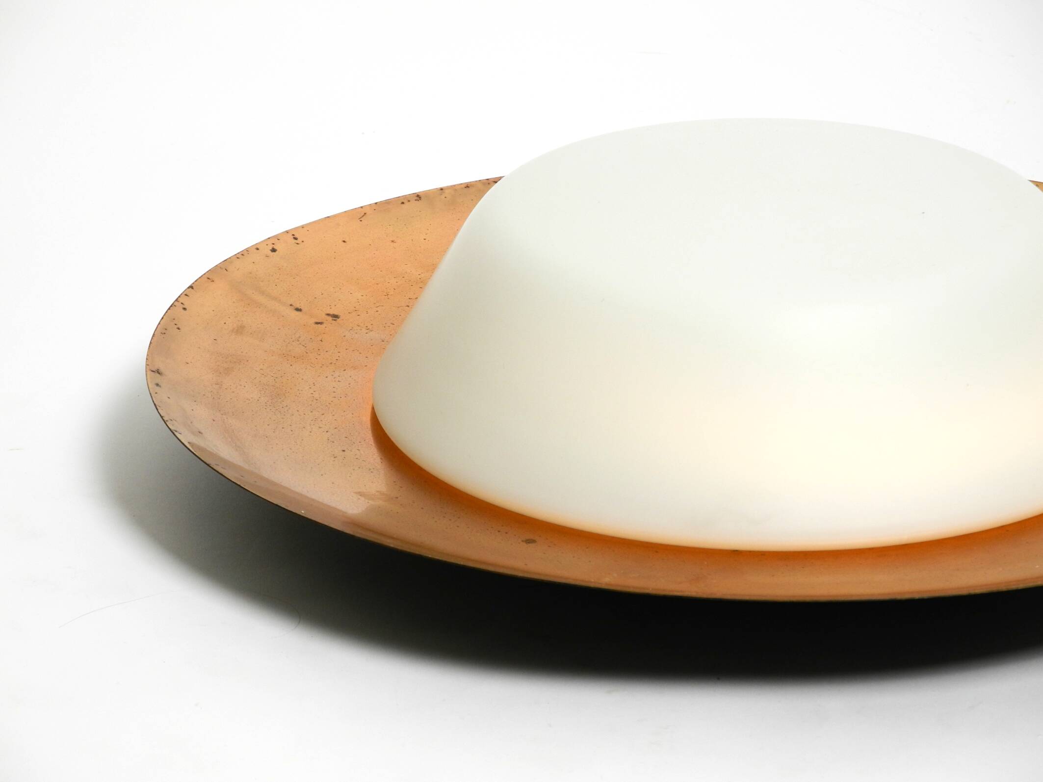 Pair of Mid Century wall or ceiling lamps made of glass with copper-plated