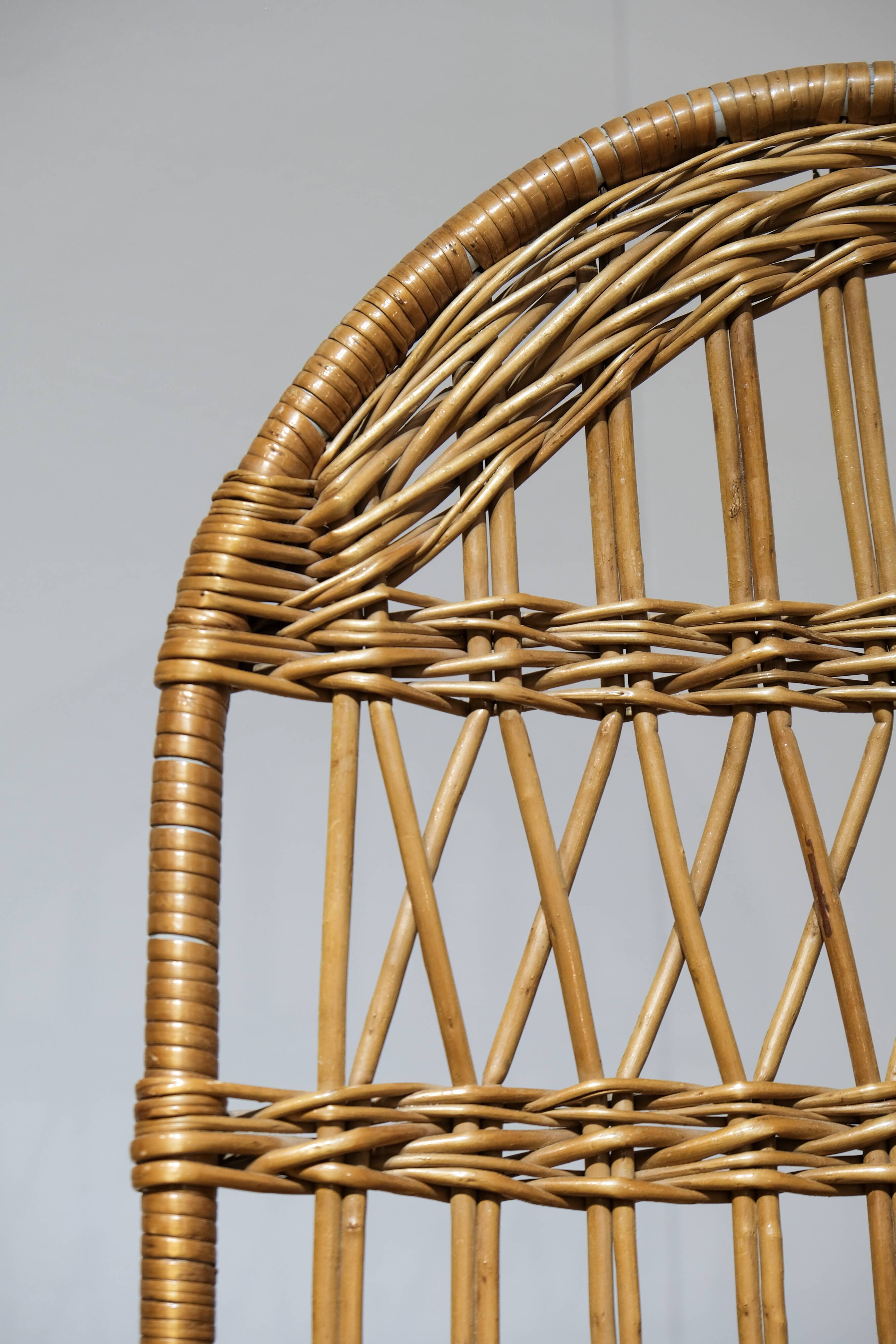 Wicker and wood rocking chair