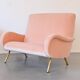 Two-seater sofa from the 1950s in pink, Pierre Frey.