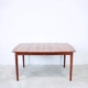 Extendable dining table in rosewood