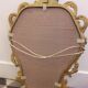 Miroir 47cm x 33cm style baroque forme ovale au cadre résine doré motif floral végétal