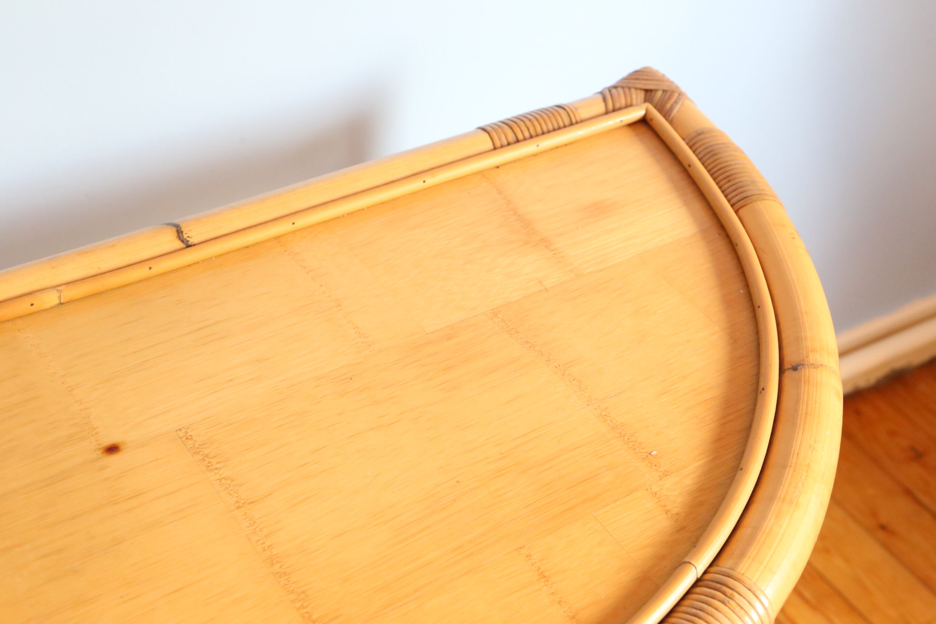 Half-moon rattan console