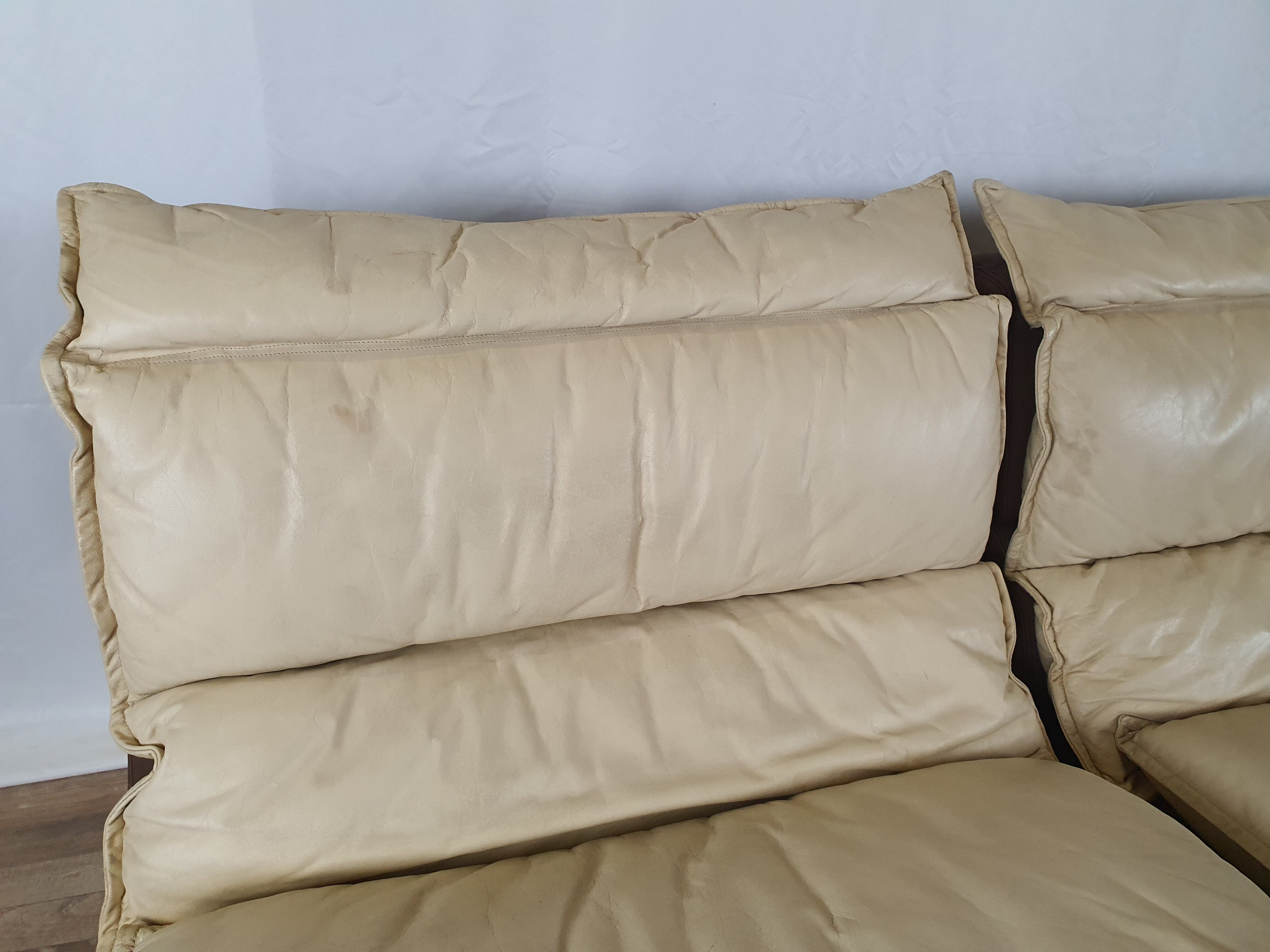 Modular sofa in leather and suede