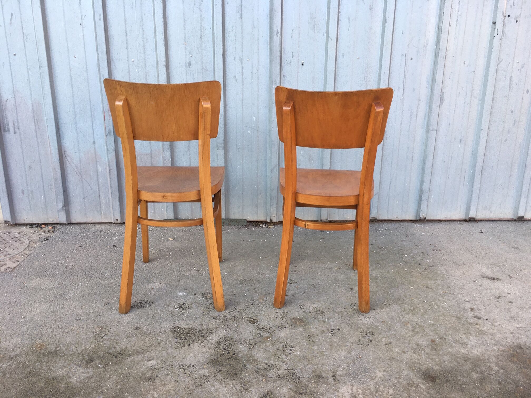 Lot of 2 vintage curved wooden thonet chairs
