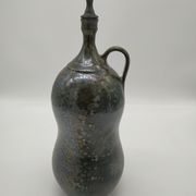Bottle in iridescent green sandstone from the ceramist jean aimé Poirier