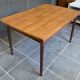 Extendable Scandinavian teak table by Johannes Andersen for Samcom Denmark.