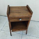 Old vintage bedside table from the reconstruction period