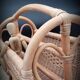 Rattan heart magazine rack