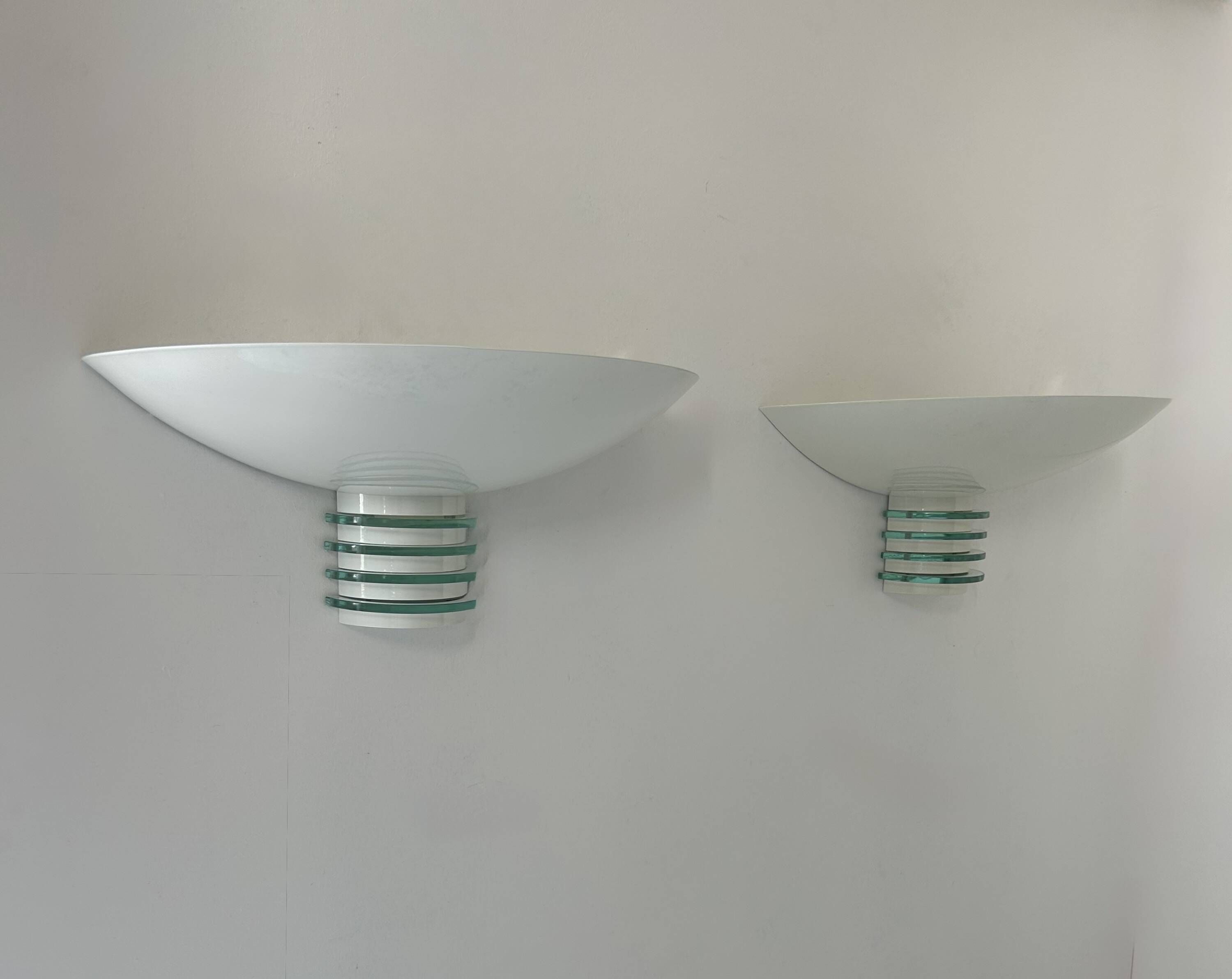 Pair of post-modernist wall lights, white metal and glass, France 1980