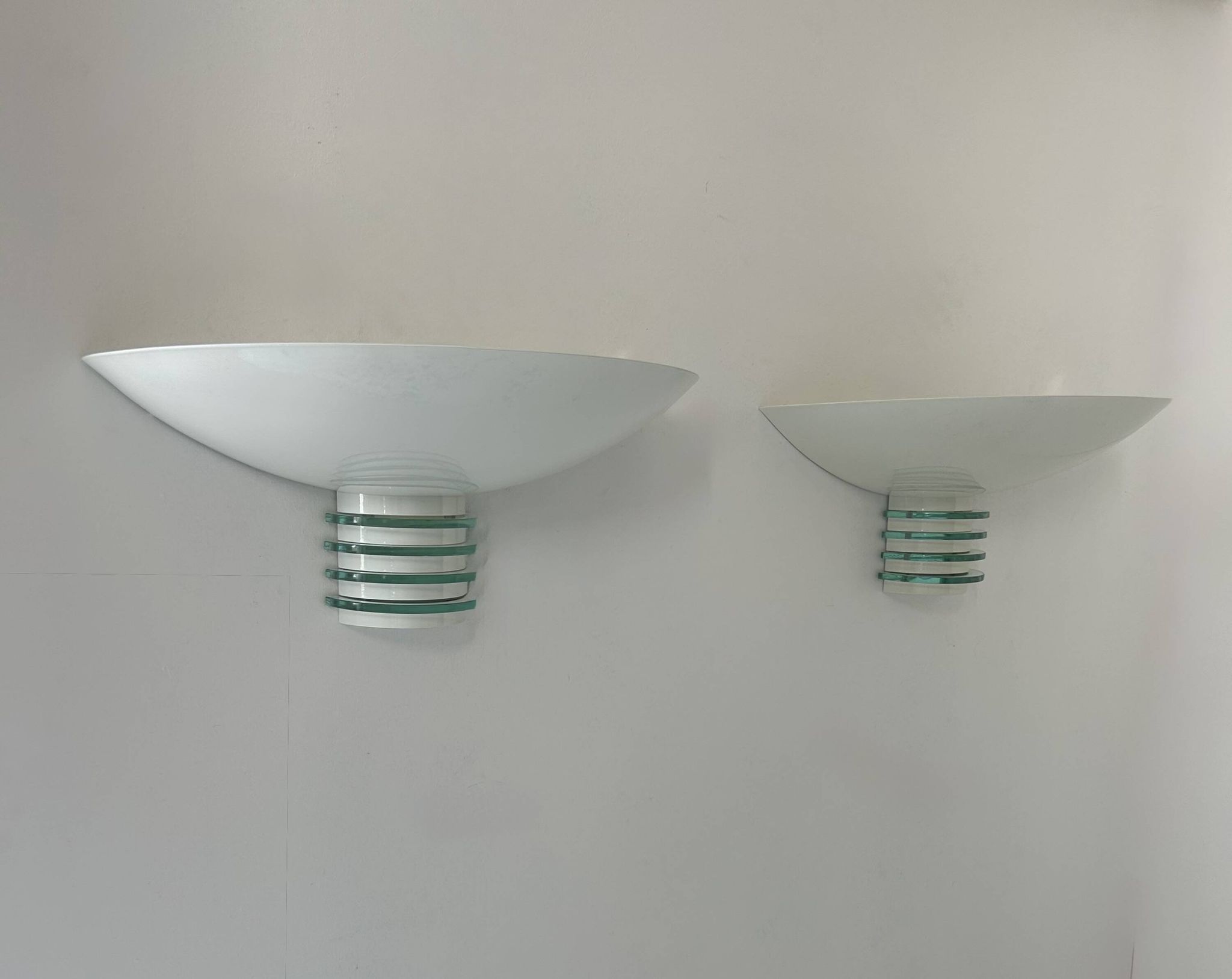 Pair of post-modernist wall lights, white metal and glass, France 1980