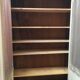 Bookcase 2 painted in ochre and cream mesh doors beginning 20 th