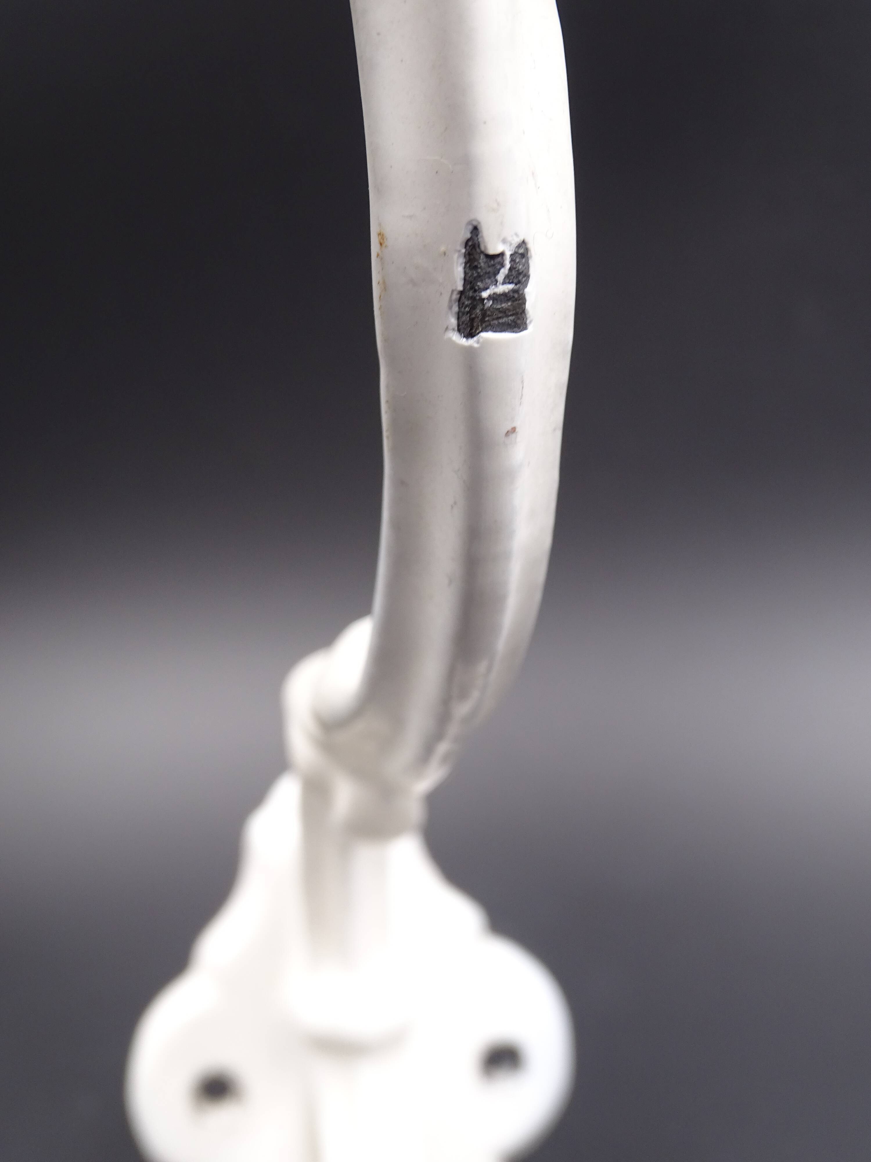 Old white enamelled metal patère