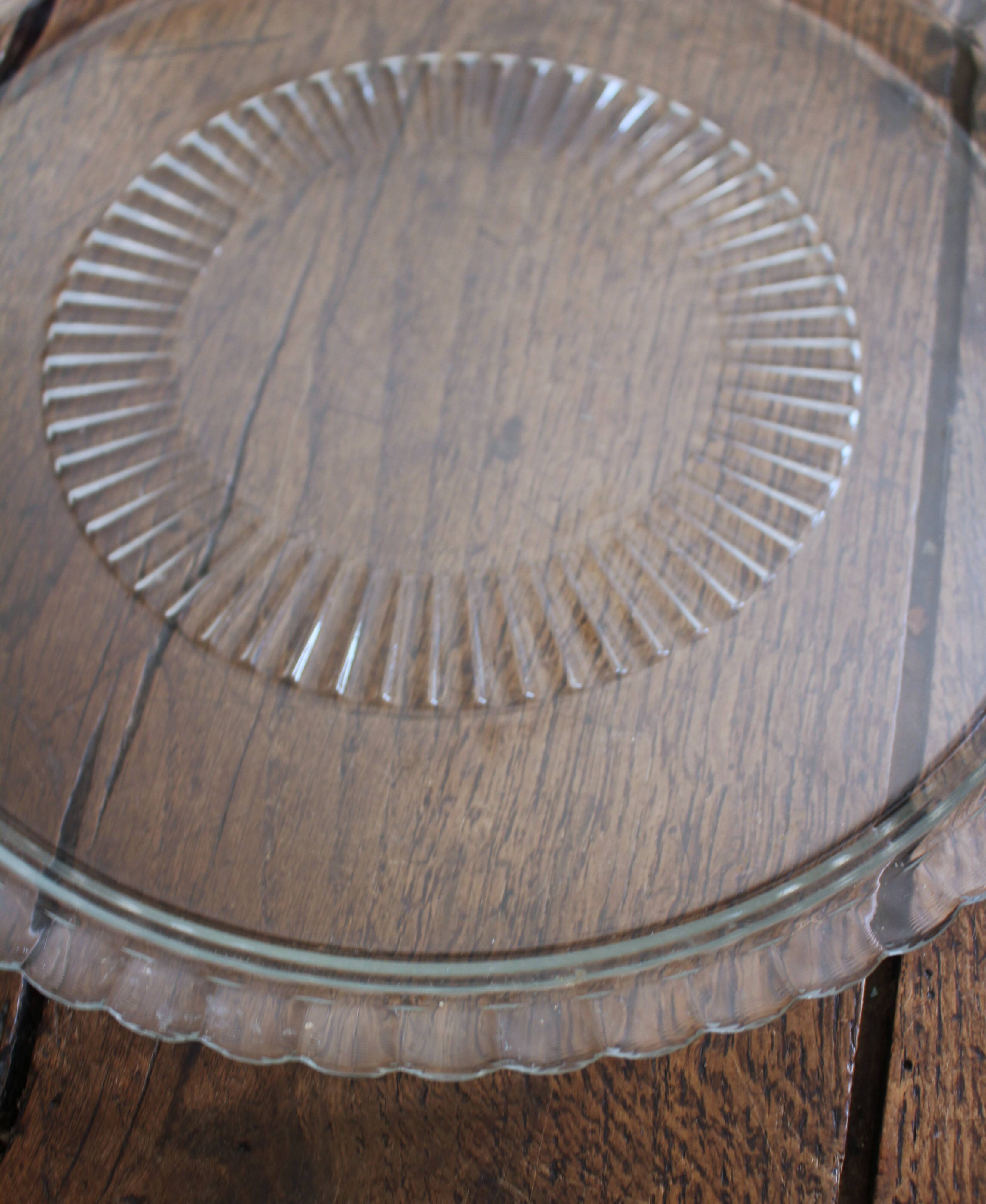 Large glass bell jar and its vintage cheese dessert plate.
