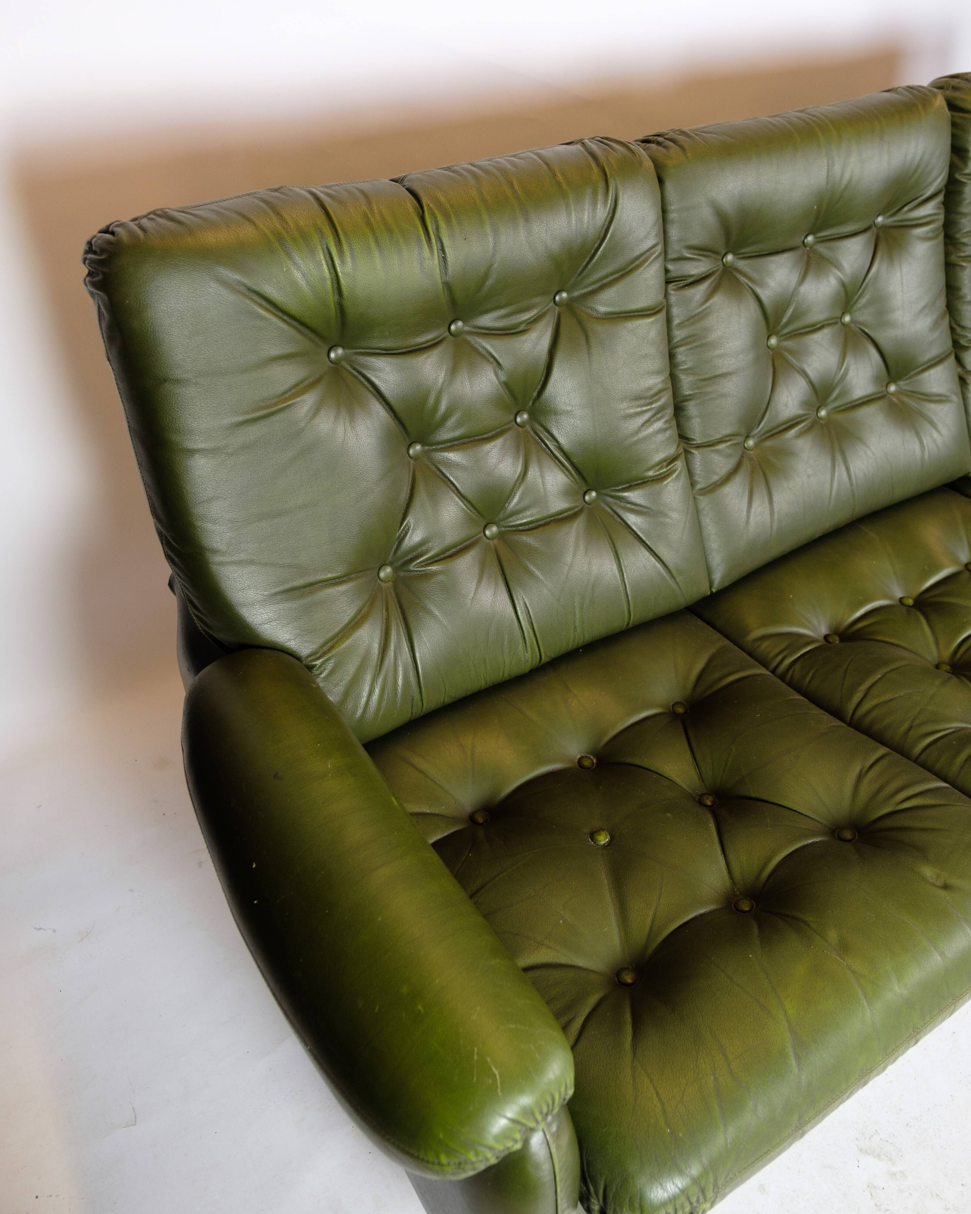 3 pers. sofa in dark green leather with chrome legs from 1970s