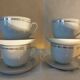 Set de 4 tasses blanches et or en porcelaine