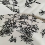 Set of black and white plates in the style of toile de Jouy.
