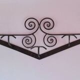 Art Deco wrought iron coat rack.