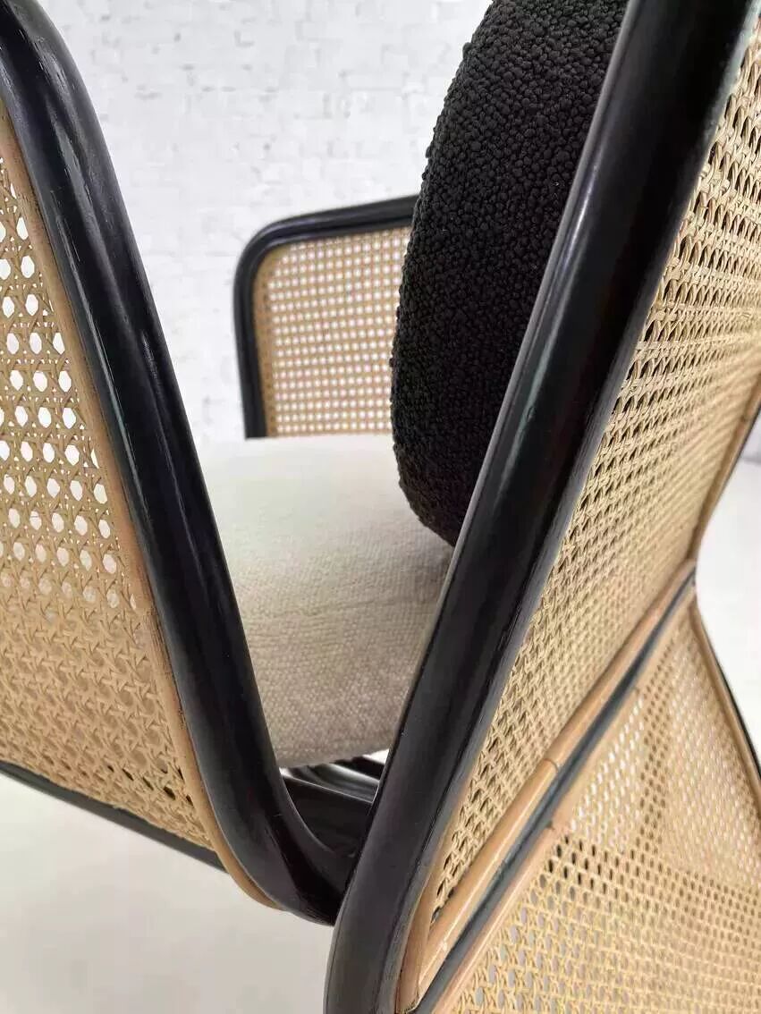 Cubic armchair in black rattan and canework