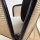 Cubic armchair in black rattan and canework