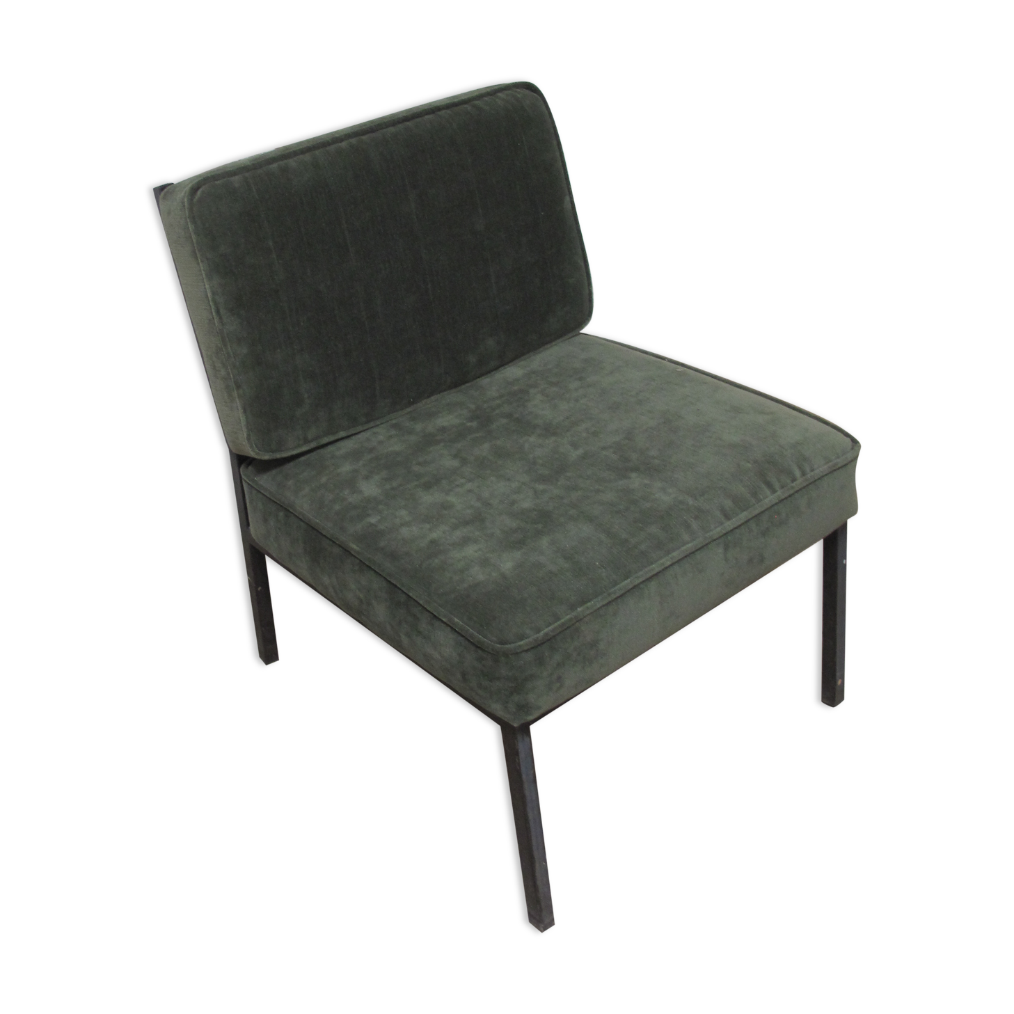Green velvet armchair