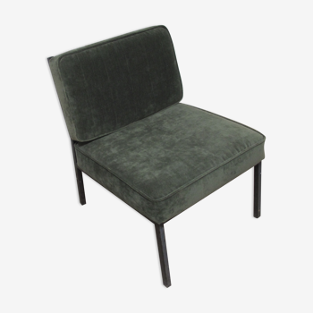 Green velvet armchair