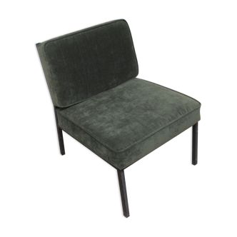 Green velvet armchair