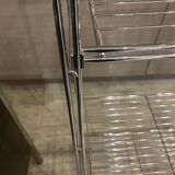 Modular wall bookshelf desk in vintage chrome.