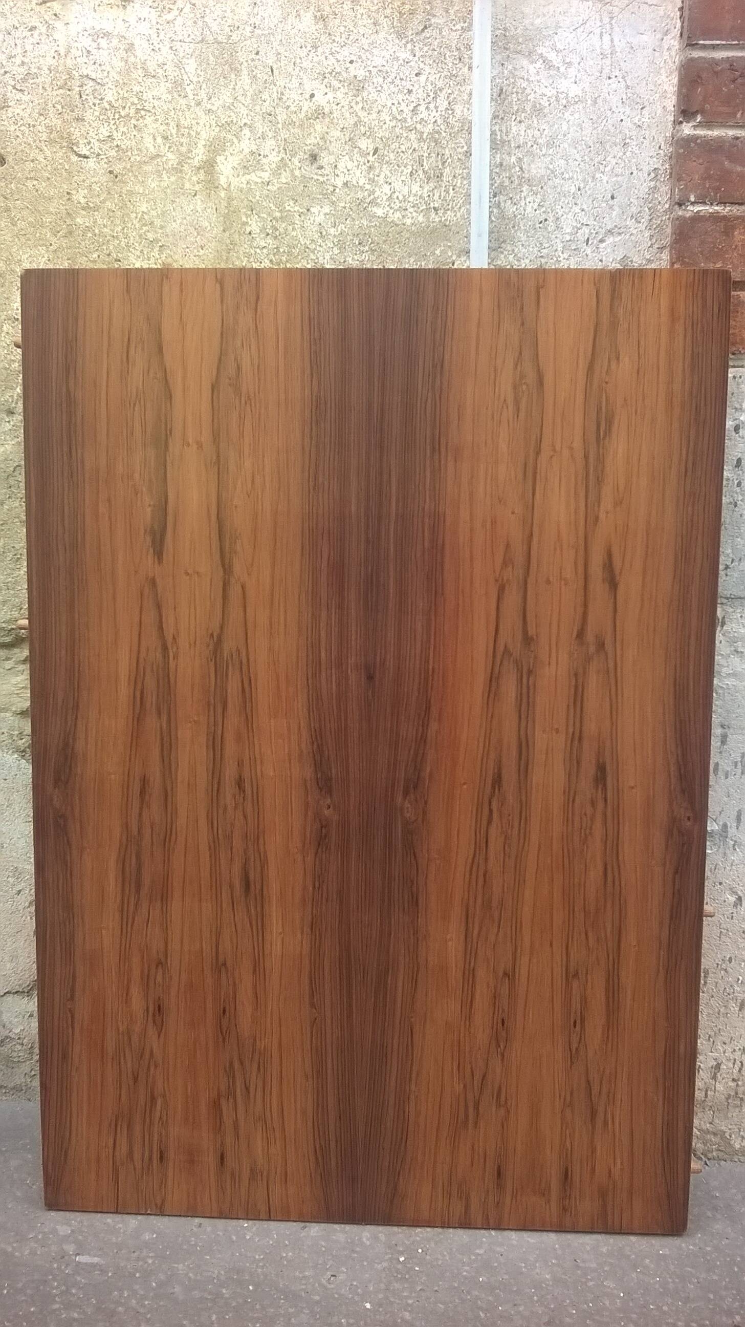 Extendable teak dining table