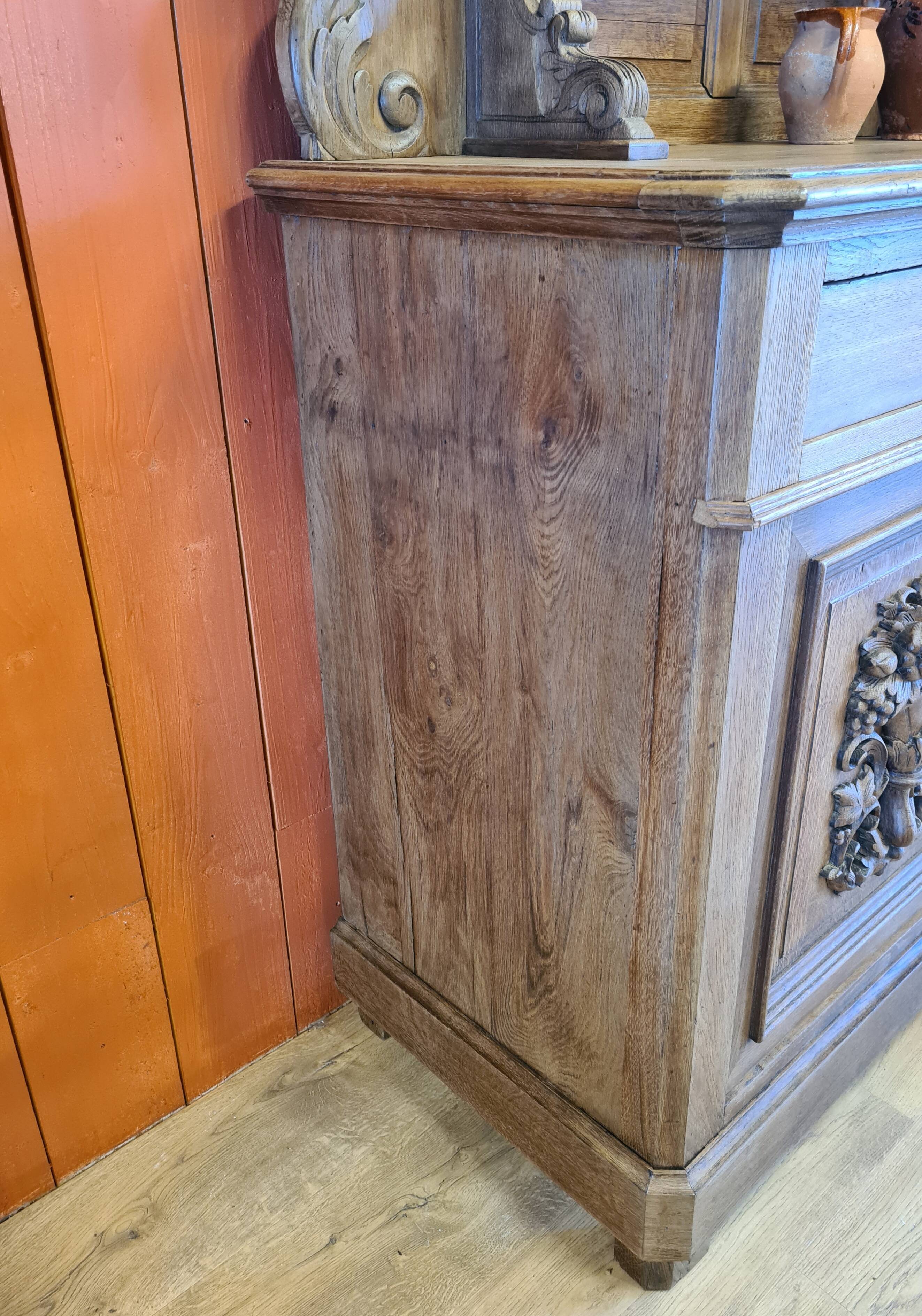 Saint Hubert oak cabinet with sculptures completely renovated