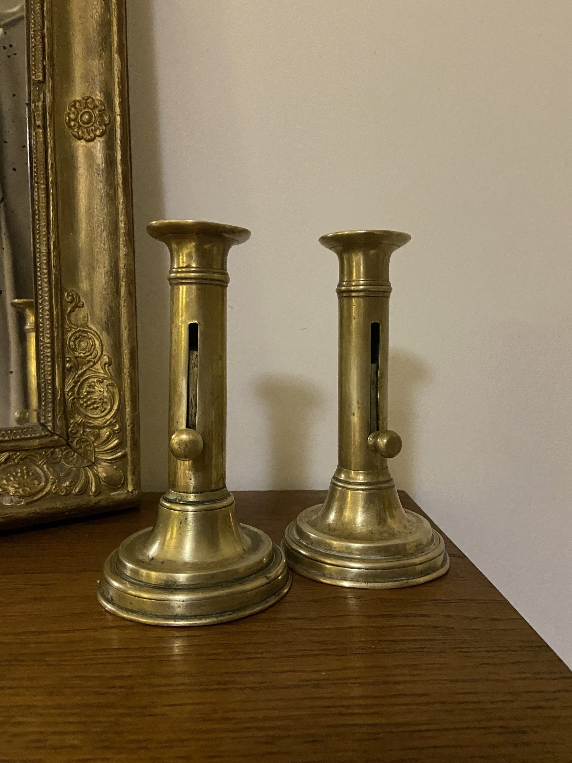 Pair of antique candlesticks with brass system