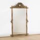 Antique faux wood mirror with bird's nest, 19th century