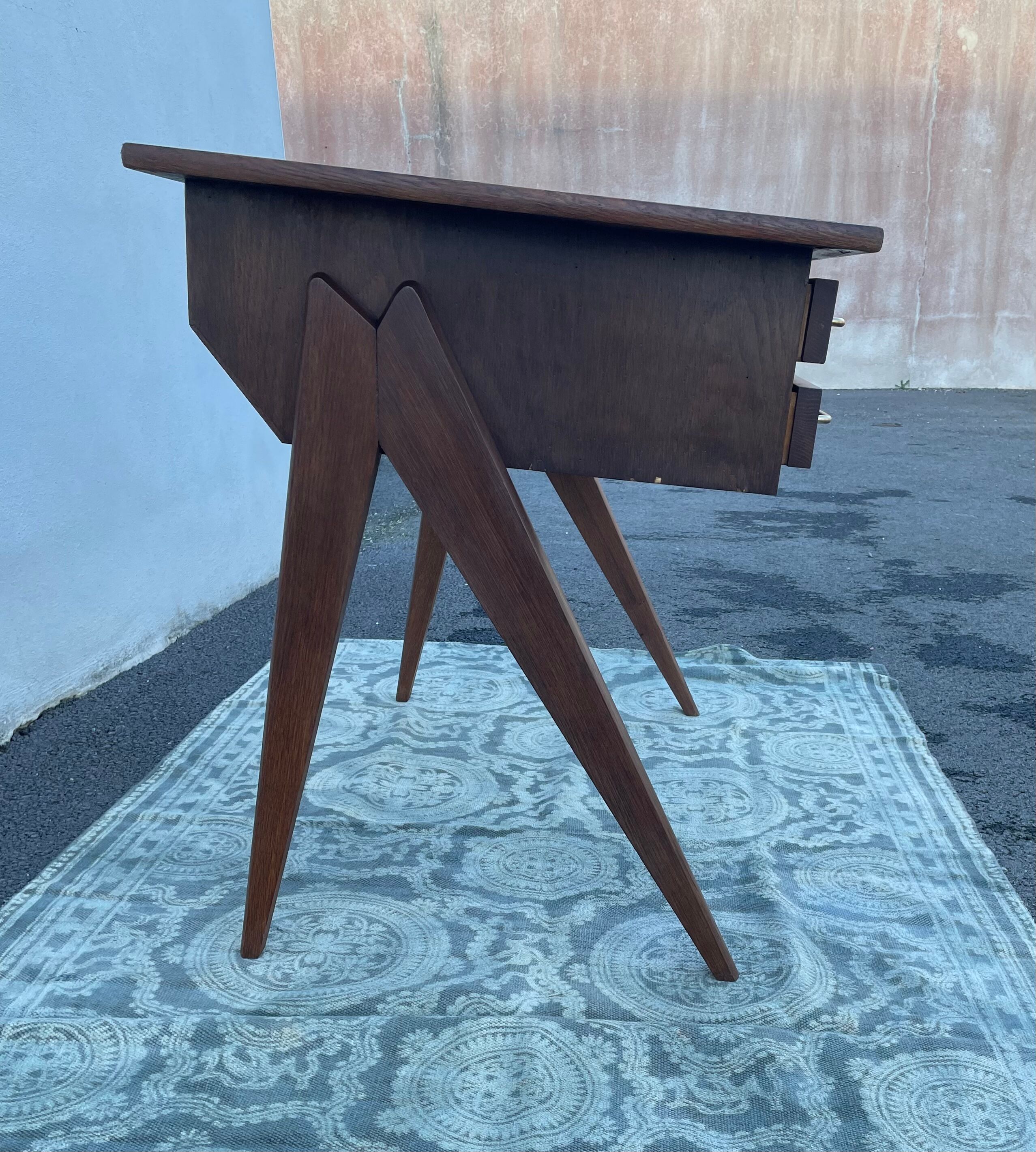 Modernist wooden desk with compass feet 1950