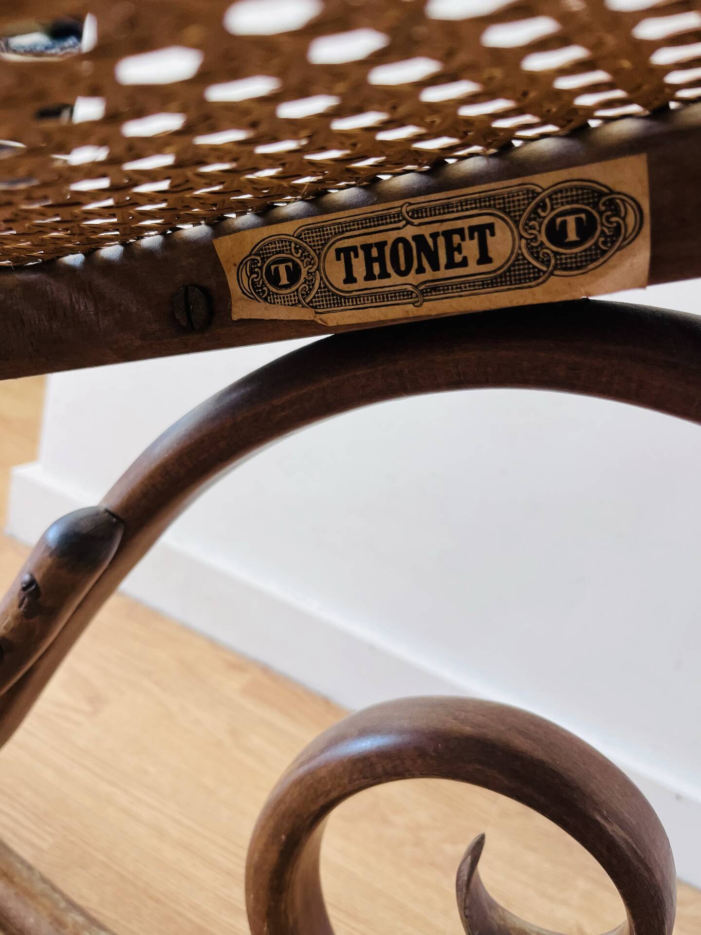 Antique Thonet bentwood rocking chair, original label.