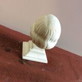 Plaster head of young girl from the 1930s