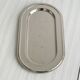 Small antique tray made of lightweight metal.