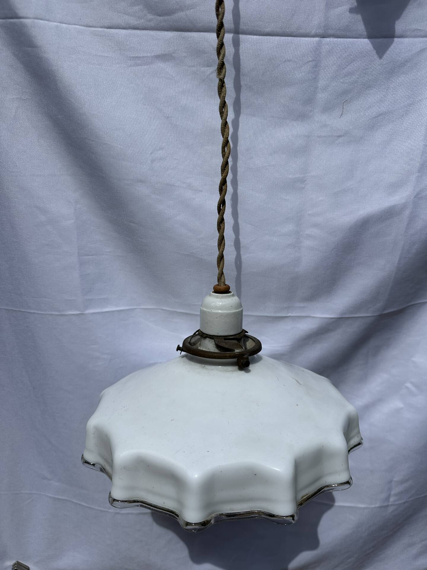 Vintage pleated opaline suspension with porcelain fittings.