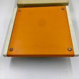 WE typewriter orange