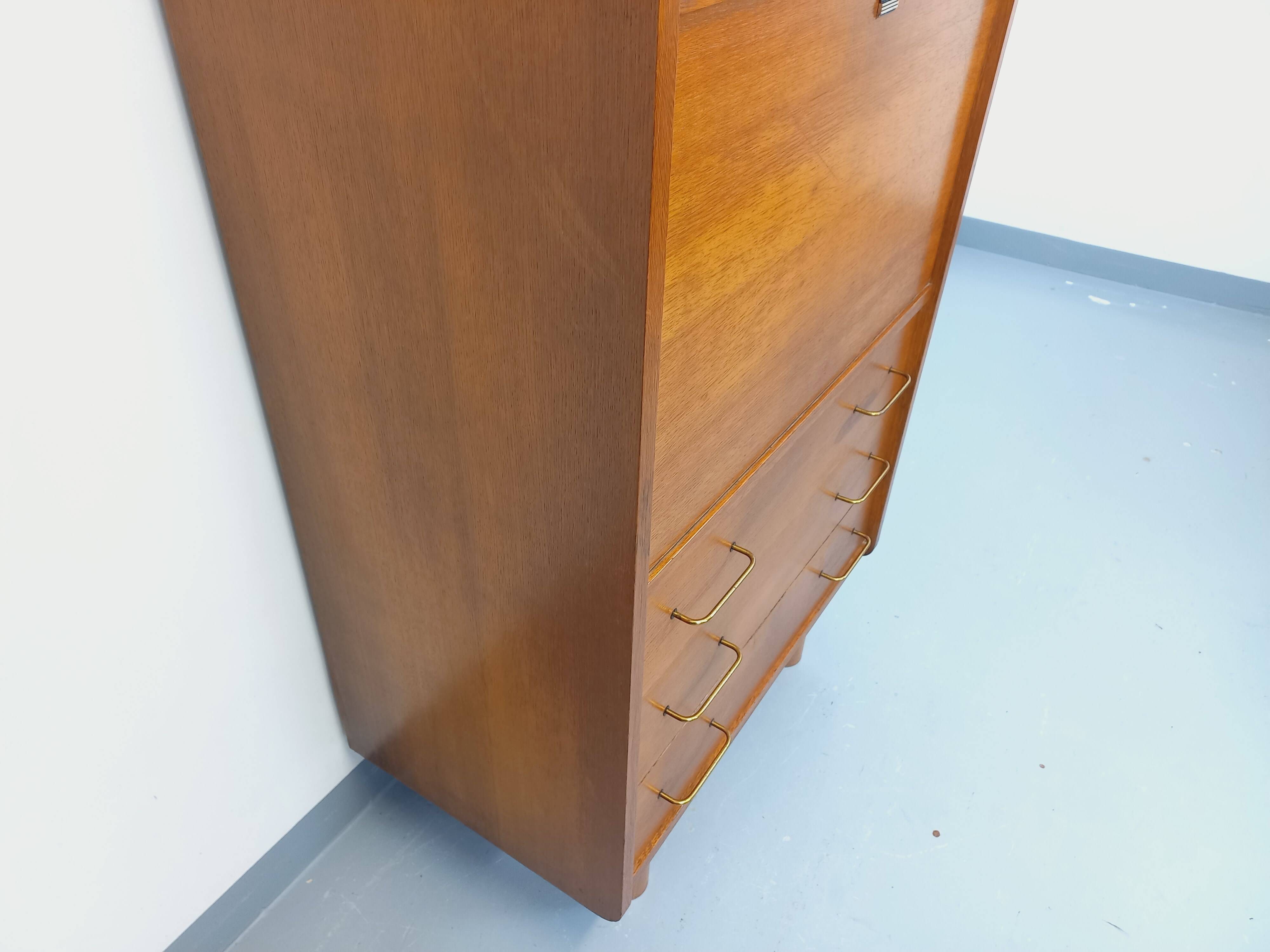 Vintage oak secretary storage furniture from the 1950s and 60s.