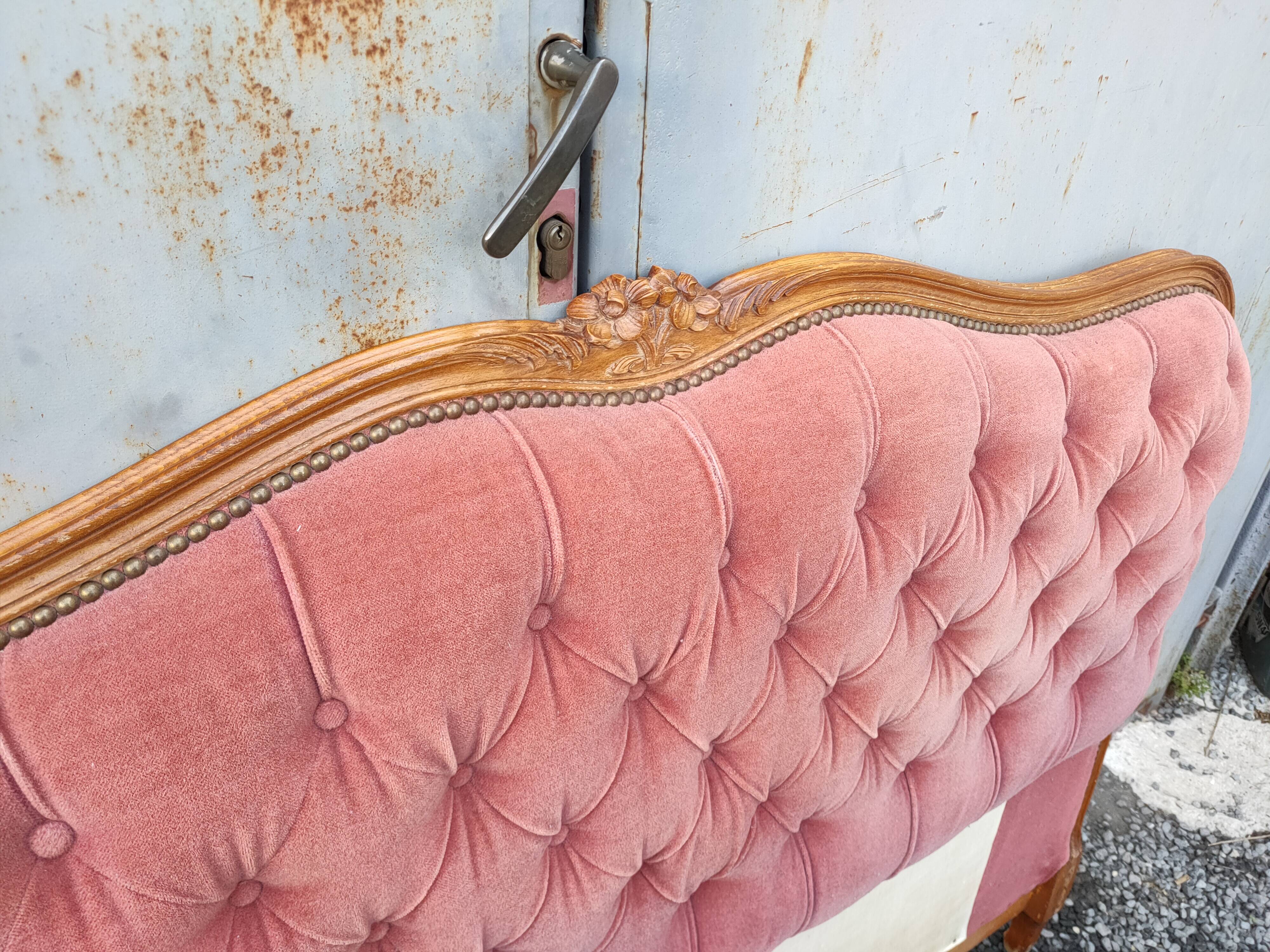 antique wooden and fabric headboard
