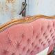 antique wooden and fabric headboard