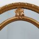 20th century neo-classical style tilted oval mirror by Deknudt, Belgium