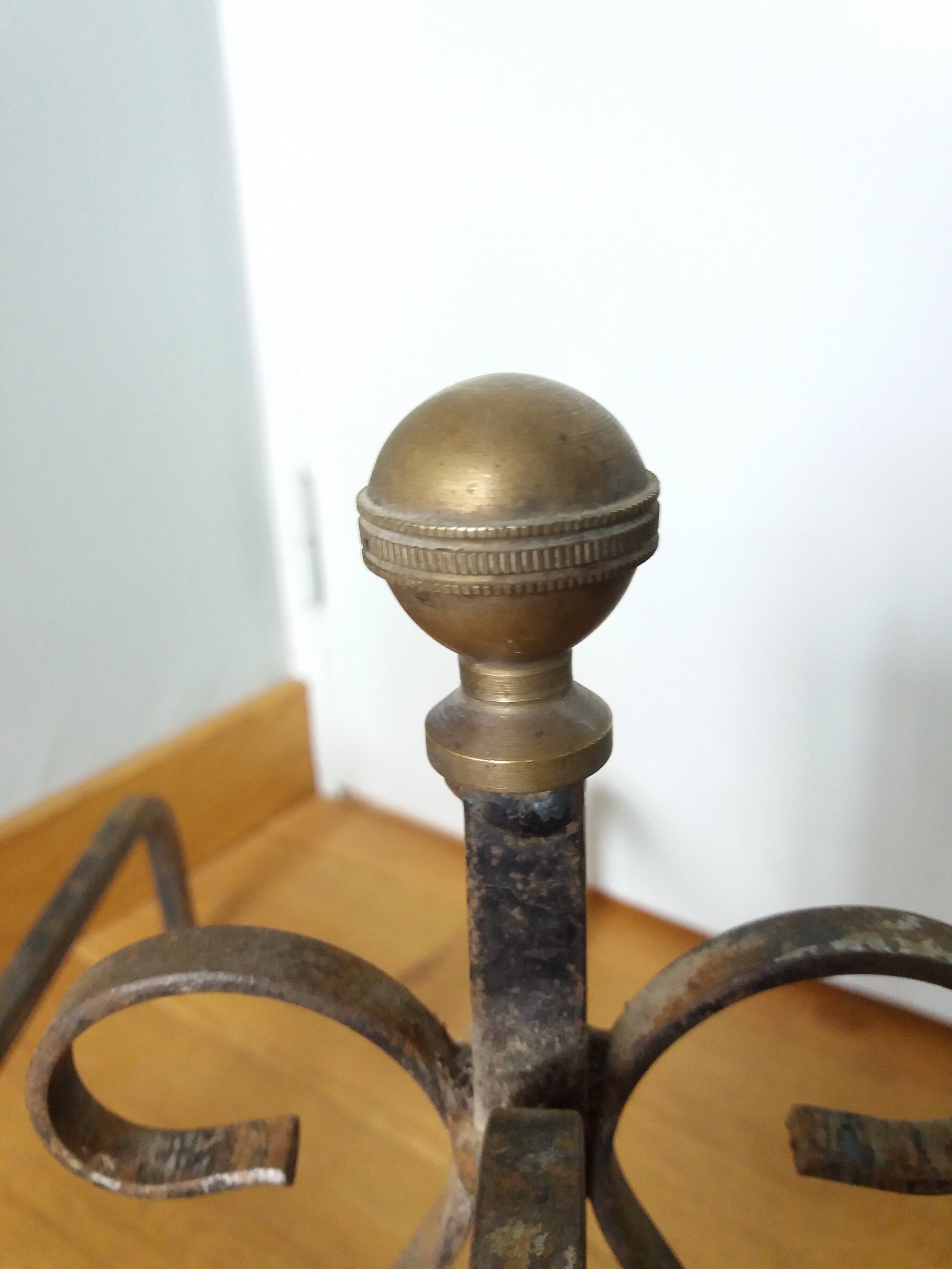 Chenets tête boule bronze doré